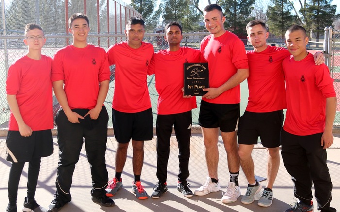 The NMMI boys tennis team poses with their first-place plaque after defeating Lovington, 6-3, in the Goddard Invitational championship Saturday afternoon at the NMMI Courts. (Photo by Peter Dindinger)